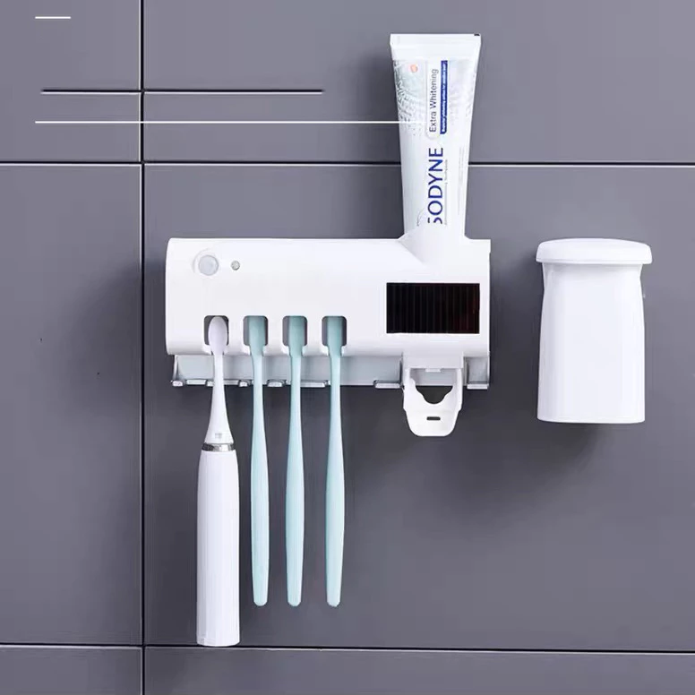 Dispenser de Creme Dental + Esterilizador UV